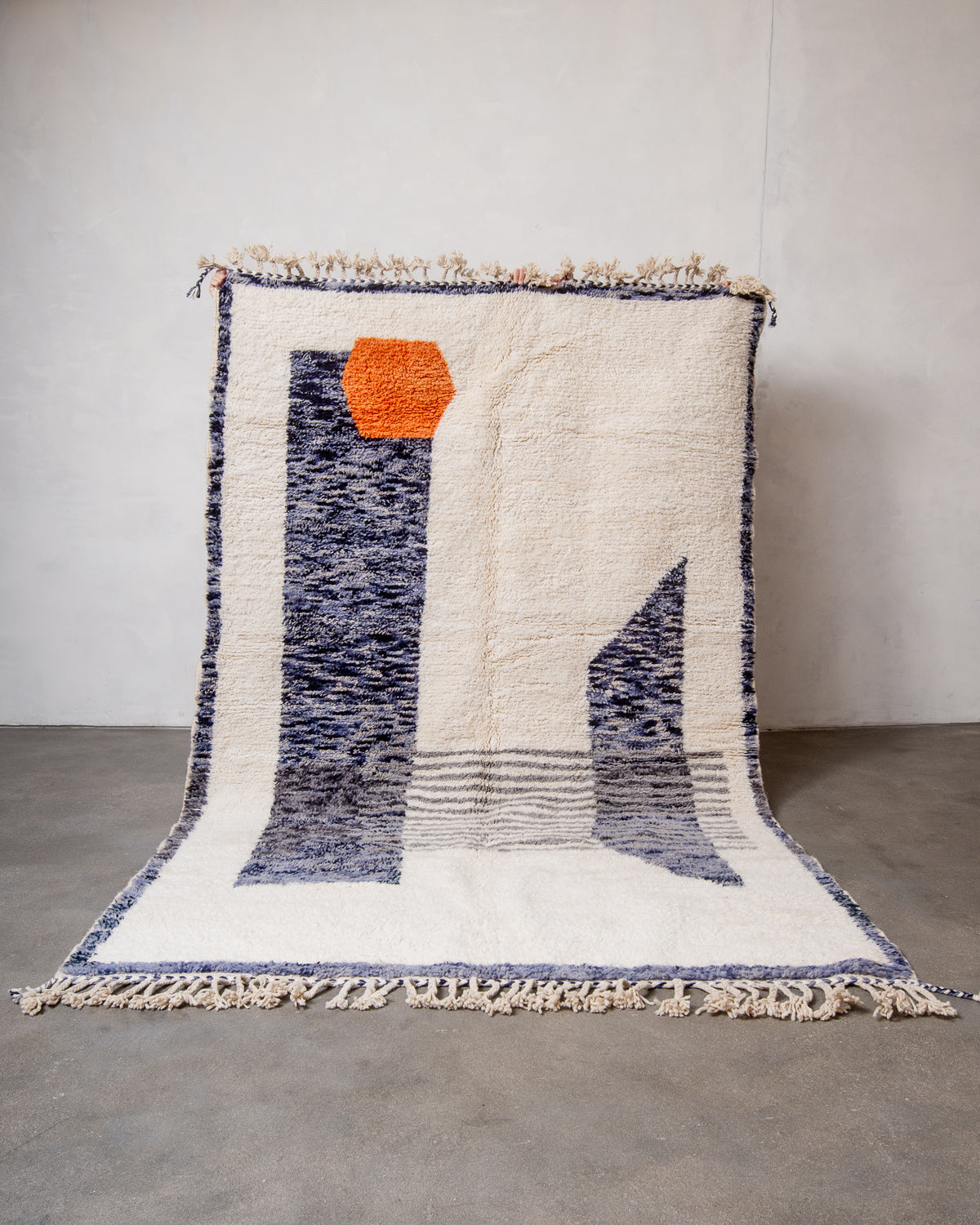 Modern, designer, handcrafted Berber rug from Morocco. Beniourain carpet with beautiful colours and patterns and fluffy wool texture.